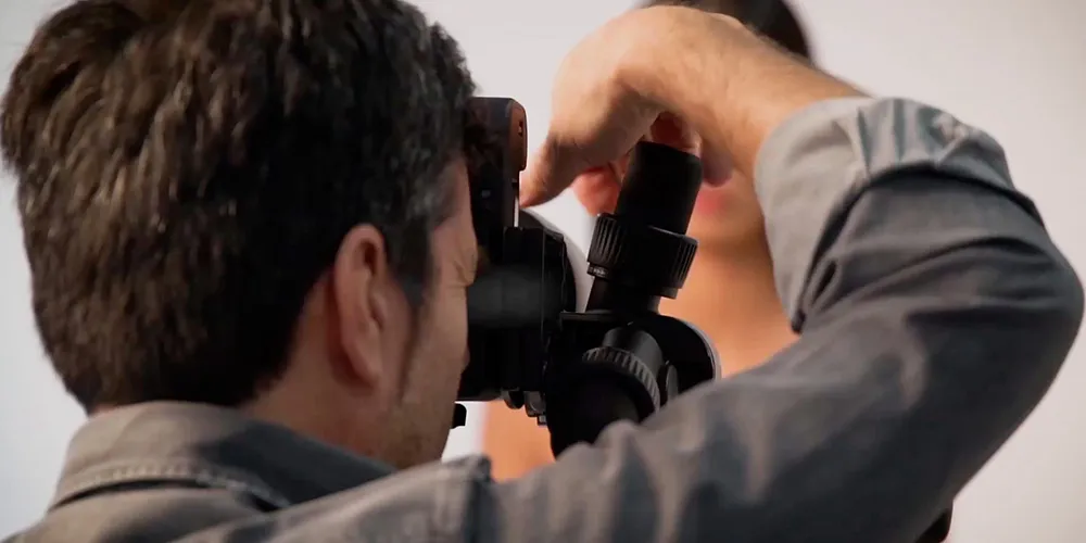 Photographer capturing images in a new state-of-the-art photography studio in Verona, inaugurated in 2017.