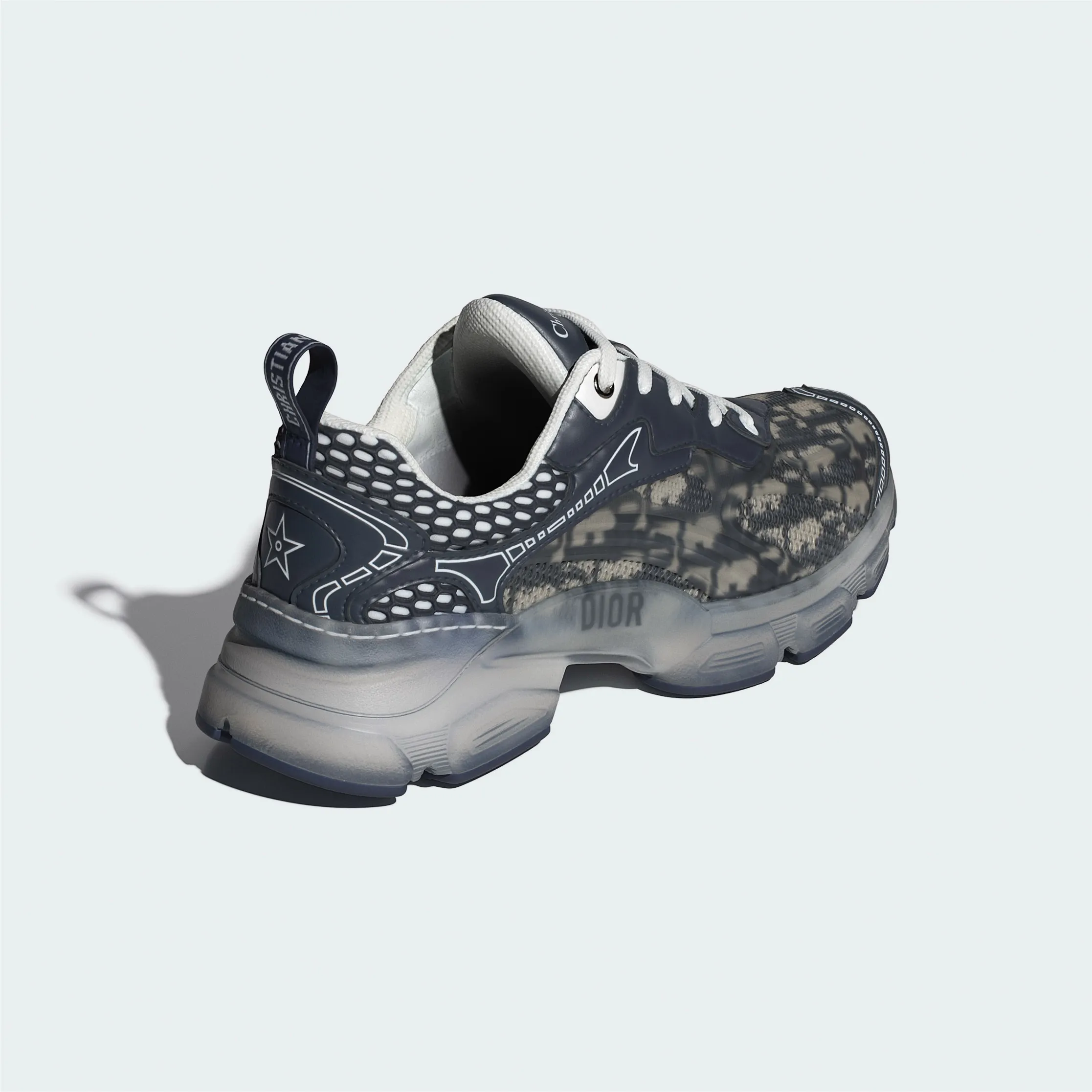 Dior designer sneaker with patterned detailing displayed in luxury fashion portfolio image