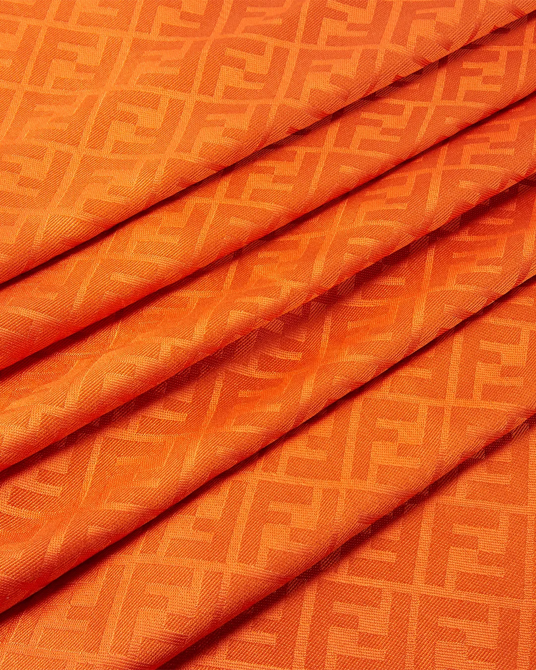 Orange Fendi fabric with signature logo pattern displayed in portfolio image