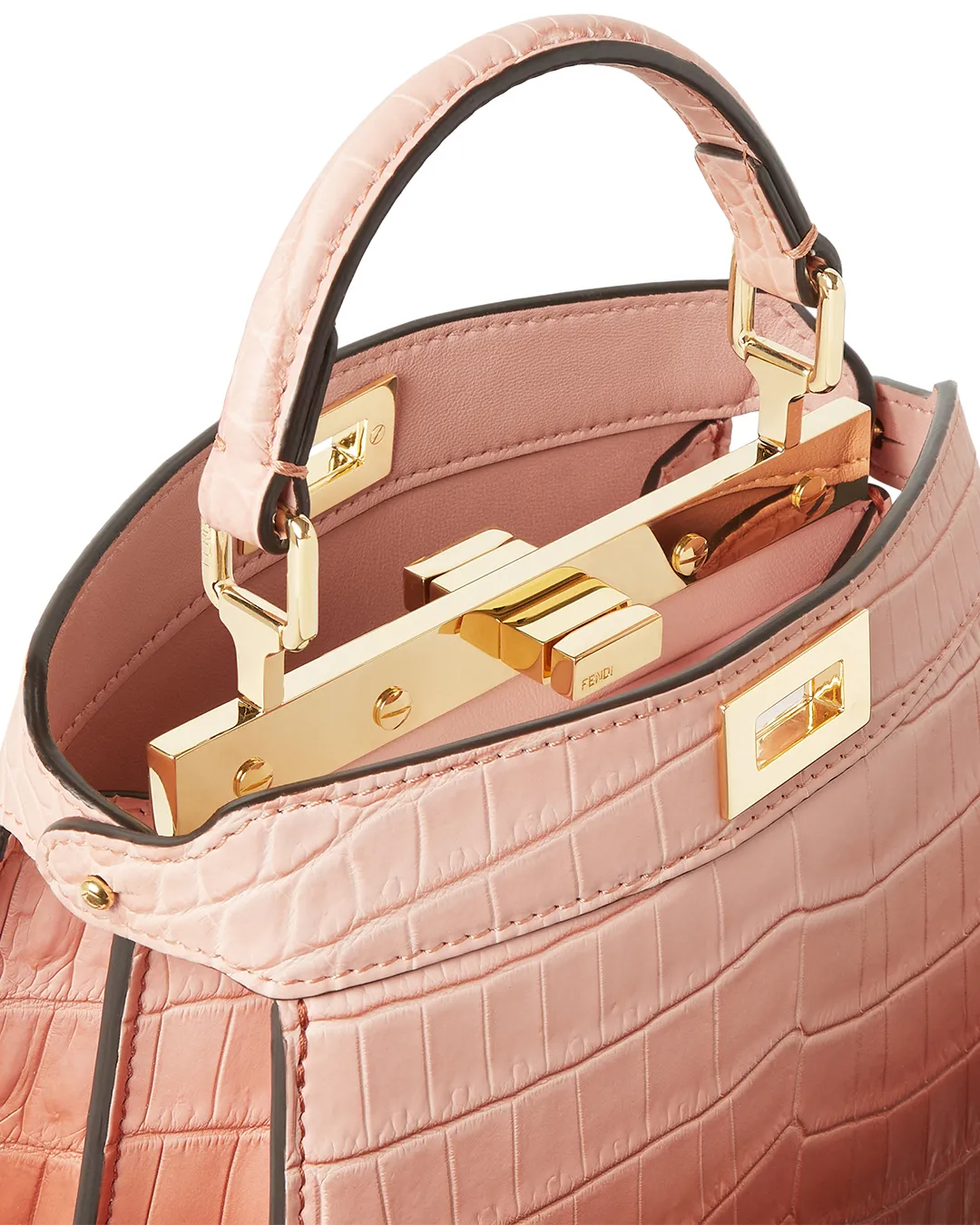 Pink Fendi handbag with gold clasp detail displayed in portfolio image