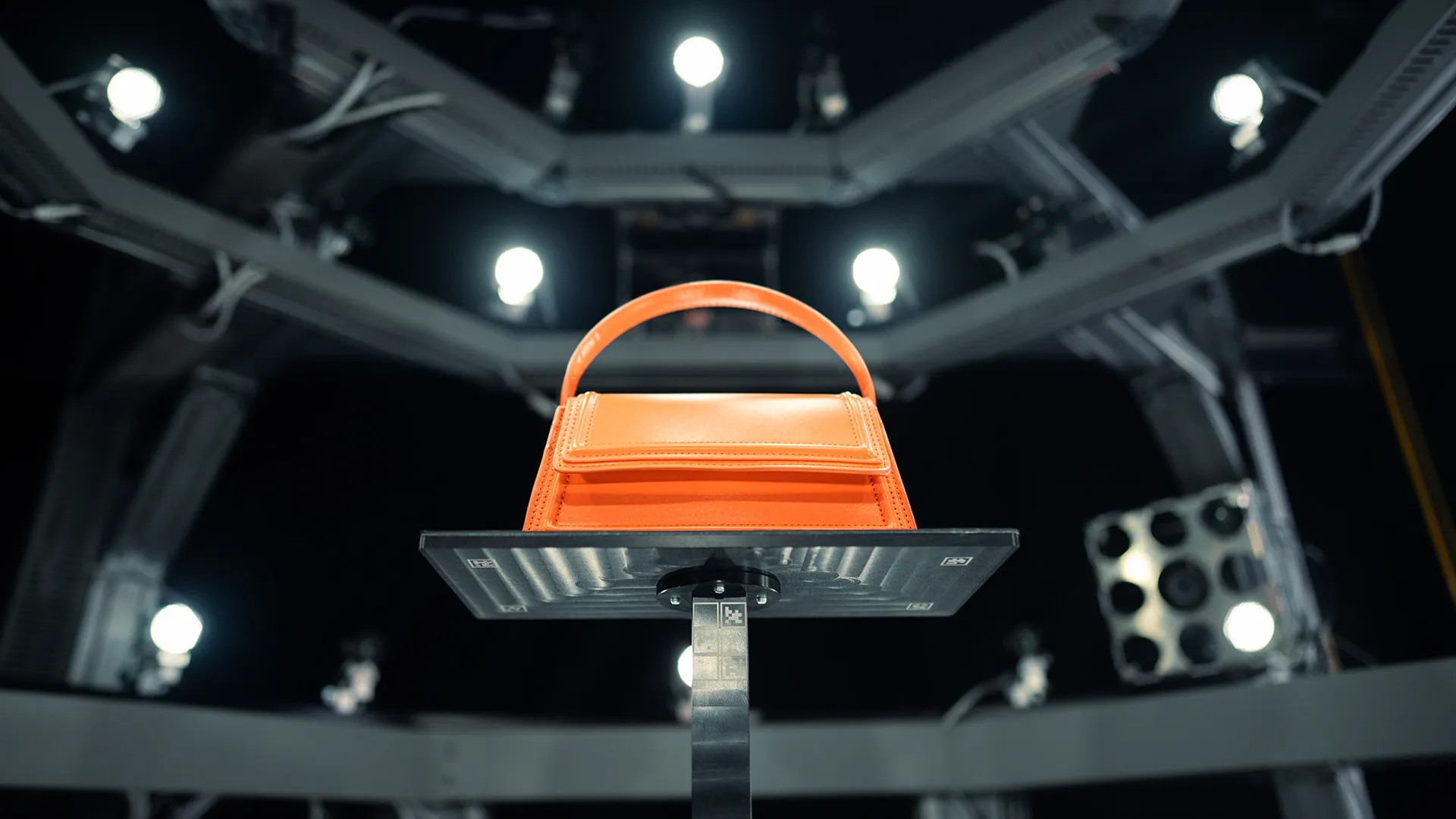 Luxury handbag undergoing advanced 3D scanning at CLX Paris studio for high-precision digital twin creation